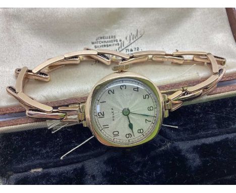 Rolex; A Vintage 9ct Gold Cased Wristwatch, the signed white dial with black Roman numerals, within plain circular case (move