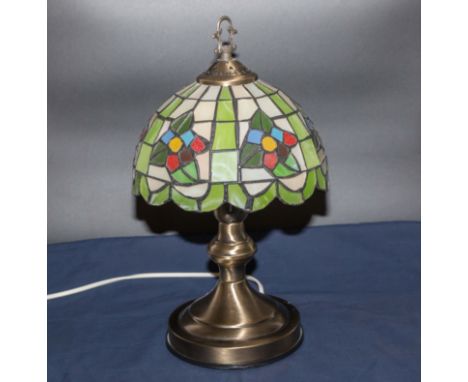 A reproduction table lamp