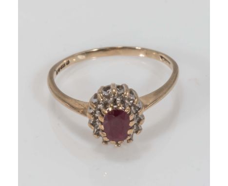 A 9ct gold ruby and diamond ring, size M