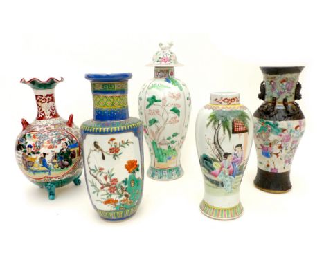 A group of Chinese vases, 20th century, including two baluster form famille rose vases, one with a depiction of two ladies in