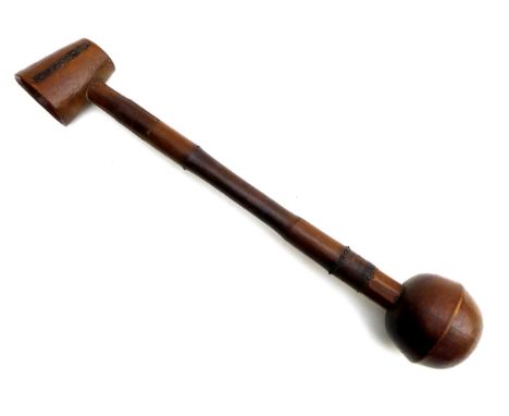 A 19th century ethnographic tribal club / ladle, carved wood with a rounded ball to one end and a cup ladle to the other, rem