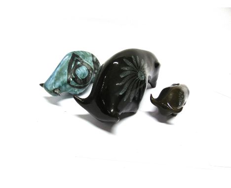 DAVID SHARPE RYE POTTERY:  a ceramic figure of a stylised bull, 23cm long, signed to base; and two further unnamed figures of
