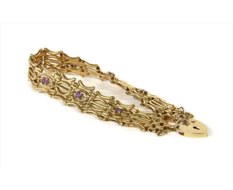 A 9ct gold amethyst five row gate bracelet, central straight bars alternately set with a round cut amethyst, to pairs of bowe