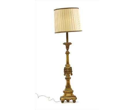 A carved and gilt stand lamp, 166cm high