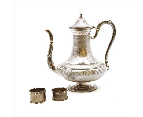 A French silver coffee pot , with engine turned decoration and anthemion frieze, the handle with ivory insulators on a circul