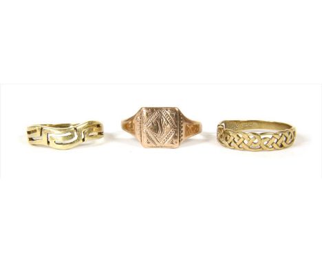 A gold openwork Greek key design ring, marked K14, finger size N, together with a 9ct gold openwork Celtic design ring, Sheff
