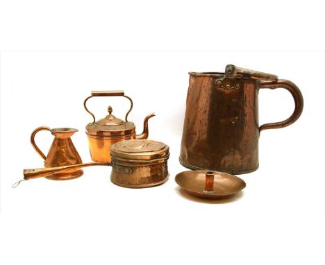 A collection of copperwares, a 'harvest' measure, jugs, measures, a brass hall lantern, and two bellows