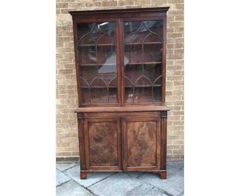 VICTORIAN MAHOGANY BOOKCASE CABINET, with moulded cornice above two glazed doors opening to reveal three adjustable shelves, 