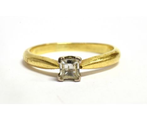 A DIAMOND SOLITAIRE 18CT GOLD RING The millennium cut diamond approx. 0.25 carat claw set to hallmarked 18ct gold shank size 