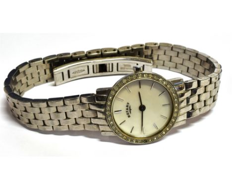 A LADIES ROTARY WINDSOR STEEL BRACELET WATCH  the mother of pearl dial to a white stone set round bezal, 23mm case size, to a