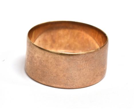 A HALLMARKED 9CT ROSE GOLD PLAIN WEDDING BAND  Of flat section 9mm wide, size R, weighing approx. 4.1 grams