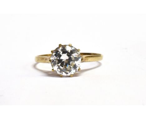 A CUBIC ZIRCONIA SOLITAIRE 9CT GOLD DRESS RING The large CZ 7.5mm dimeter claw set to hallmarked 9ct gold shank and stamped C