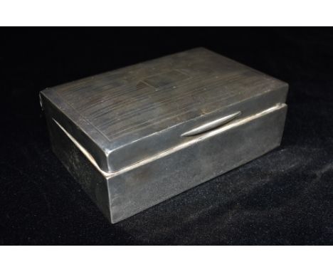 SILVER CIGARETTE BOX Of traditional rectangular shape with engine turned decoration to lid 14 cms x 9 cms cedar lined, weight