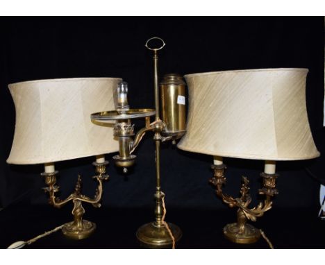 A PAIR OF ROCOCO STYLE TWIN LIGHT ORMOULU TABLE LAMPS  45cm high including shades; together with an adjustable brass rise and