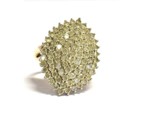 AN OVAL DIAMOND CLUSTER RING 9ct gold ring with small round brilliant cut diamonds with a total diamond weight 2.50 carat (st