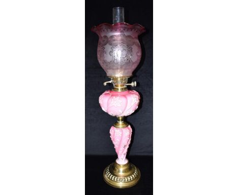A GOOD LATE VICTORIAN/EDWARDIAN GLASS AND BRASS OIL LAMP  the vaseline glass shade with acid etched decoration, twin burner a