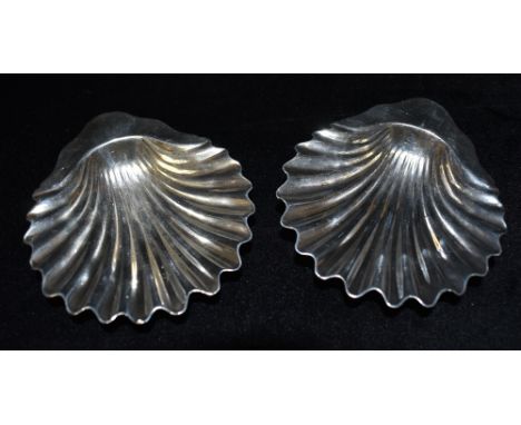 A PAIR OF VICTORIAN SILVER SHELL DISHES  by Mappin &amp; Webb, London, hallmark for 1887, 12cm long, weighing approx. 4.3ozt 