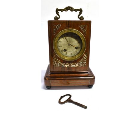 A ROSEWOOD CASED MANTLE CLOCK  with mother-of-pearl inlaid decoration, 16.5cm wide 23cm high Condition Report : movement loos