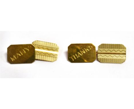 A PAIR OF 9CT GOLD CHAIN CUFFLINKS The rectangular cut corner links with engine turned design to one side, the other plain si