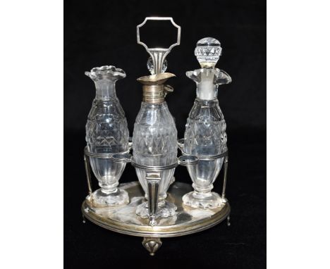 A GEORGIAN SILVER FOUR PIECE GLASS The oval silver stand, 21 cms high, London hallmark for 1802, maker possibly James Graham,