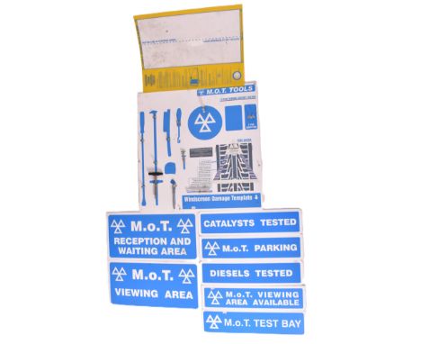 Automobilia - a selection of M.O.T signs and boards. The lot comprises M.O.T Viewing Area, Catalysts Tested, Diesels Tested, 