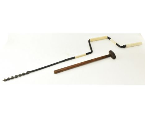 Railwayana - a large early 20th-century pig-stick (used for unhooking from coupling) finished in black and white. Together wi