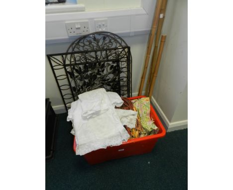 A Christening gown together with curtains, a quantity of fabric, set of bamboo poles and pierced decorative grills