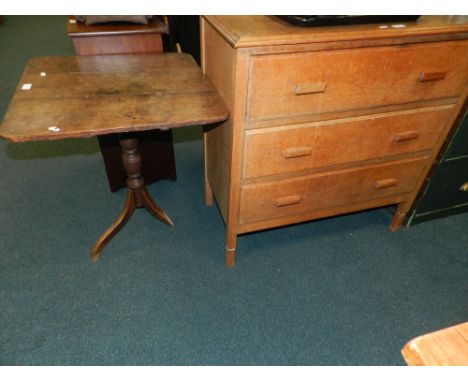 A 19th century oak pedestal tripod table (at fault), along with an Edwardian mahogany open pot cupboard and an oak chest of t