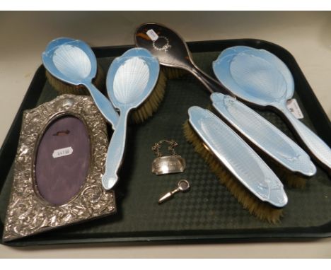 A Birmingham silver and blue enamel dressing table brush set together with a tortoiseshell backed brush, a silver Sherry deca