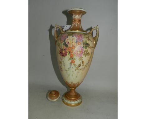 A Royal Worcester blush ivory twin-handled vase and cover, circa 1900-1910, painted in polychrome with an assortment of predo