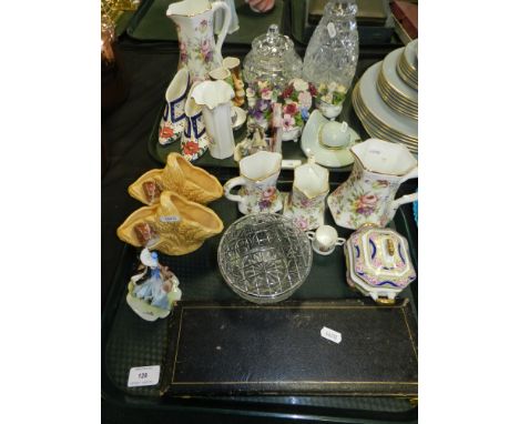 A graduated set of four Fenton china jugs, together with a pair of Sylvac basket vases, shape 5542, a modern Spode twin handl