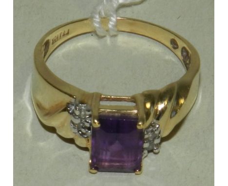 An amethyst and diamond set dress ring.