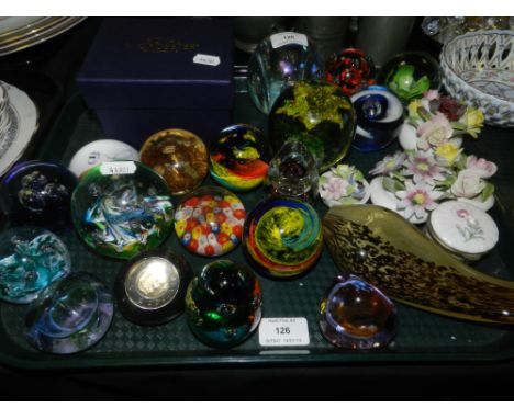 A selection of glass paperweights to include Caithness examples together with decorative table posies and a Royal Worcester Q