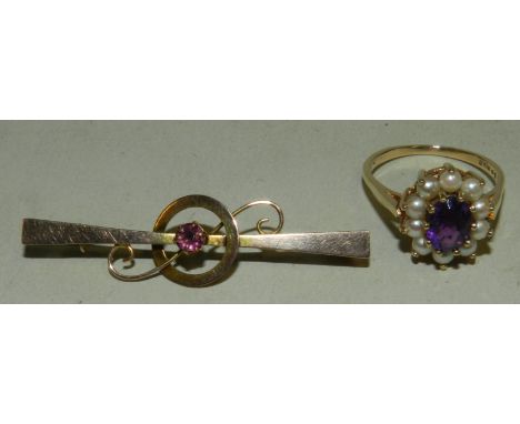 A 9ct gold amethyst and split pearl set cluster ring, together with a garnet set yellow metal bar brooch, stamped '9ct', tota