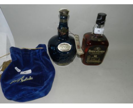 A House of Lords Deluxe Blended bottle of Scotch Whisky and a 21 year old Royal Salute bottle of Blended Scotch Whisky in blu