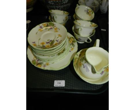 A Royal Doulton tea service, in the 'April V200' pattern, comprising six cups, six saucers, side side plates, twin handled ca