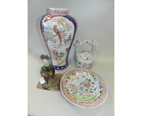 An Imari style vase, a reproduction Tang style figure of a lady, in sancai glazes, a 'kitchen Ming' dish and a reproduction f