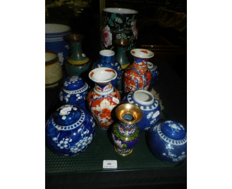 Modern Chinese and Japanese ceramics to include a large famille noir vase, various blue and white ginger jars and covers, two