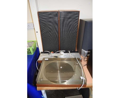 A Bang &amp; Olufsen Beogram 1200 record player together with a Beomaster 1200 mixer and a pair of speakers