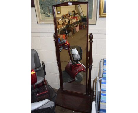 A cheval mirror on stand