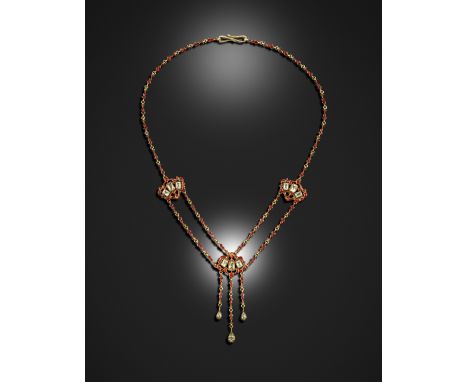 A chrysolite and enamel decorated gold necklace by Carlo &amp; Arthur Giuliano, the three scroll mounts are each set with thr