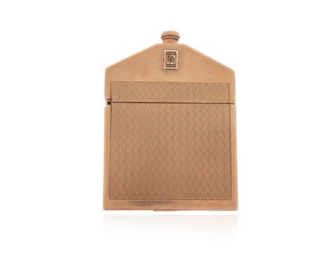 A 9ct gold Rolls Royce lighter by Alfred Dunhill, London hallmarks for 1931, inscription to the reverse, 5.5cm high, 48g