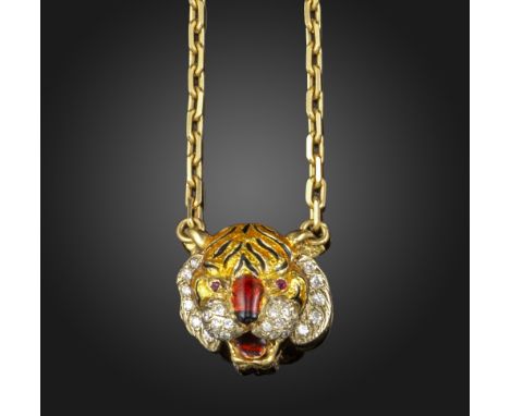 A gem-set gold tiger pendant, the stylised tiger's head set with diamonds and decorated with polychrome enamel in gold, with 