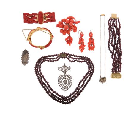 ? A garnet three row bead necklace, with matching six row bracelet, a Victorian coral brooch and earrings, a carved coral bra