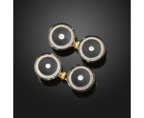 A pair of black enamel and diamond-set gold cufflinks, each circular link centred with a circular-cut diamond and outer borde