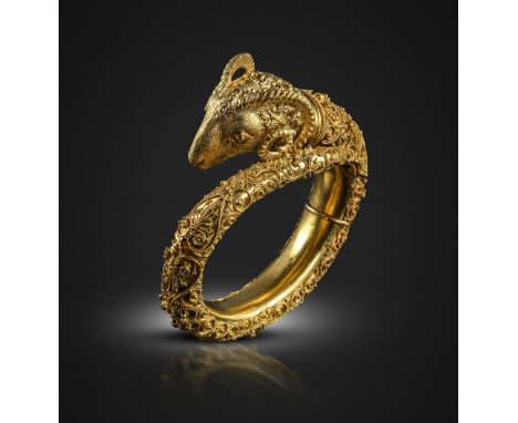 A very fine 19th century Etruscan Revival ram's head gold bangle, the head beautifully textured with realistic wool, the tape
