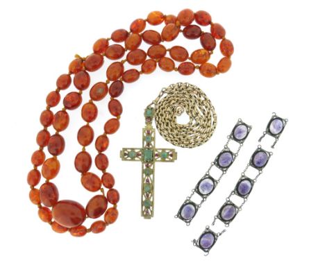 A single-row graduated amber bad necklace, 58cm, a stone-set gilt metal cross and a damaged amethyst bracelet