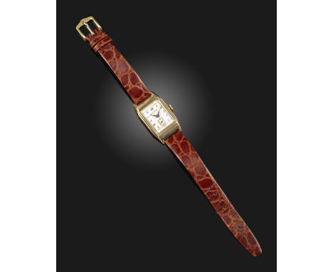 A gentleman's gold wristwatch by Longines, the signed rectangular dial with black Arabic numerals and subsidiary seconds dial