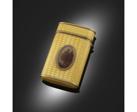 A two colour gold and silver gilt enamel cigarette case by Fabergé, the rectangular oval section with yellow guilloche enamel