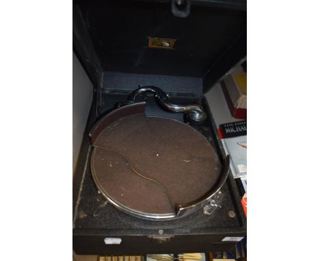 A late Victorian HMV gramophone or record player with an additional record stacker.